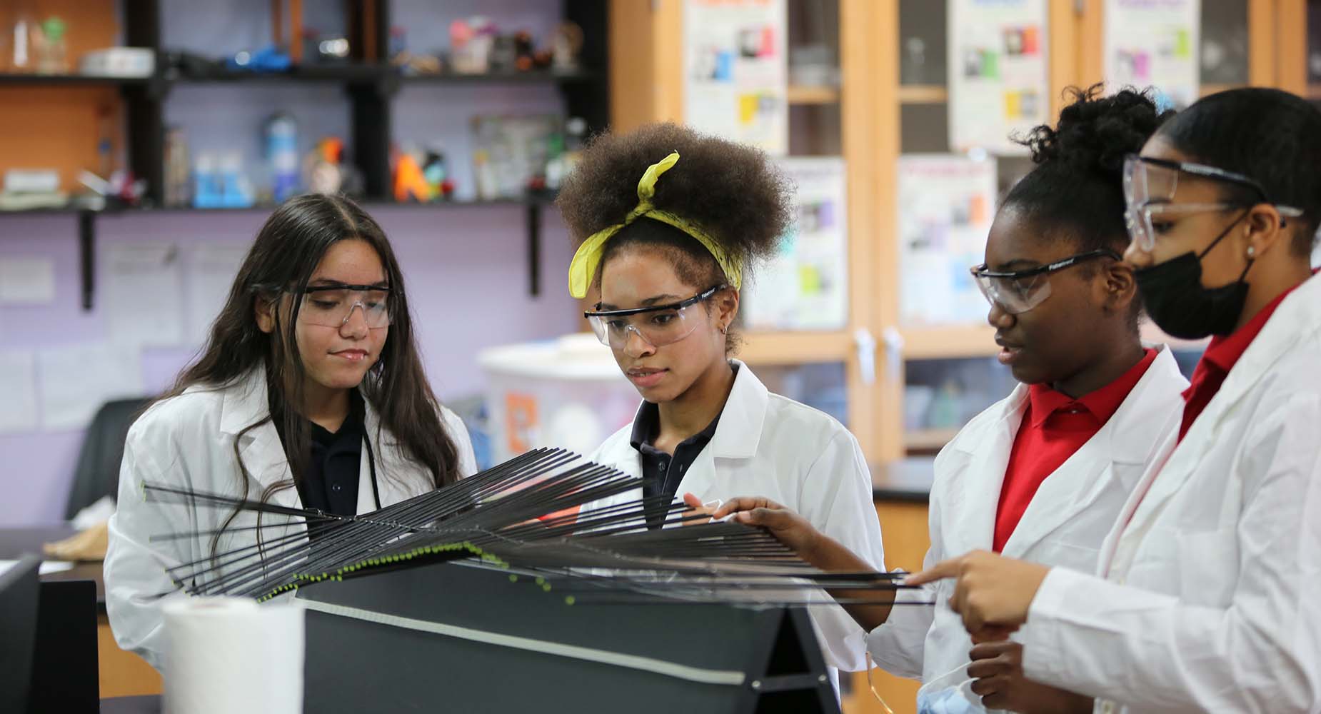 Teacher helping student